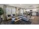 Comfortable living room flows into dining area and kitchen, perfect for gathering and entertaining at 2156 Monk Dr, Haw River, NC 27258