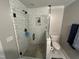 Modern bathroom featuring glass enclosed tile shower at 223 E Nash St, Spring Hope, NC 27882