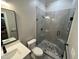 This bathroom has modern fixtures, stylish tile, and a glass-enclosed shower at 223 E Nash St, Spring Hope, NC 27882