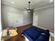 This bedroom features great light, hardwood floors, and an expansive closet at 223 E Nash St, Spring Hope, NC 27882
