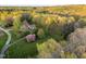 Aerial view showing a house and its surrounding meticulously kept green lawn at 2259 Helena Moriah Rd, Timberlake, NC 27583
