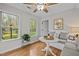 Breakfast nook with large windows offering views of the backyard at 2259 Helena Moriah Rd, Timberlake, NC 27583