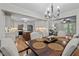 Open dining area flowing into a modern kitchen and living room at 2259 Helena Moriah Rd, Timberlake, NC 27583