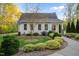 Well-manicured front yard with charming home featuring manicured shrubs and inviting walkway at 2259 Helena Moriah Rd, Timberlake, NC 27583