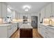 Bright, modern kitchen with stainless steel appliances, granite countertops, and a center island at 2259 Helena Moriah Rd, Timberlake, NC 27583