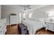 Spacious main bedroom with hardwood floors, ensuite bath, and ample natural light at 2259 Helena Moriah Rd, Timberlake, NC 27583