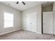 Bright bedroom with ample closet space and a neutral color scheme at 24 Cider Ct, Benson, NC 27504