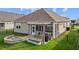 Backyard featuring a fire pit, patio with pergola, and screened-in porch at 252 Tyree Trl, Burlington, NC 27215