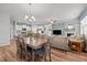Open floor plan with dining area, kitchen, and living room, great for entertaining at 252 Tyree Trl, Burlington, NC 27215