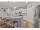 Beautiful kitchen with stainless steel appliances, granite counters, and a center island with seating at 252 Tyree Trl, Burlington, NC 27215