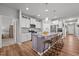 Modern kitchen with stainless steel appliances, granite countertops, and island with seating at 252 Tyree Trl, Burlington, NC 27215