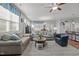 Spacious living room featuring neutral color palette, ceiling fan, and lots of natural light at 252 Tyree Trl, Burlington, NC 27215