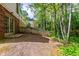 Backyard with a privacy fence and mature trees, perfect for outdoor enjoyment at 2720 Townedge Ct, Raleigh, NC 27612