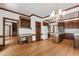 Bright Dining Room area with hardwood floors, large windows, and adjacent desk at 2720 Townedge Ct, Raleigh, NC 27612