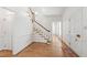 An inviting entry with hardwood floors and a staircase at 2720 Townedge Ct, Raleigh, NC 27612