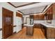 Charming kitchen with custom wood cabinets, marble counters, and stainless appliances at 2720 Townedge Ct, Raleigh, NC 27612