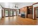 Spacious Living Room area with fireplace, wood trim, and access to outdoors at 2720 Townedge Ct, Raleigh, NC 27612