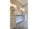 Bathroom featuring double sink with marble countertop and stylish tile flooring at 305 N Webb St, Selma, NC 27576