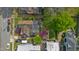 Birds-eye view of a home featuring a backyard garden, patio, and mature trees at 308 S Pearl St, Rocky Mount, NC 27804