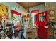 Eclectic dining room with unique decor, plants, and a vintage cabinet at 308 S Pearl St, Rocky Mount, NC 27804