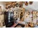 Cozy kitchen with white cabinets, unique decor, and a vintage-style stove at 308 S Pearl St, Rocky Mount, NC 27804