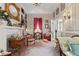 Elegant living room boasts ornate decor, rich textures, and a cozy fireplace area at 308 S Pearl St, Rocky Mount, NC 27804