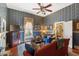 Bright and inviting living room with patterned wallpaper and comfortable seating at 308 S Pearl St, Rocky Mount, NC 27804