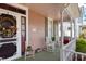 Charming front porch with seating, decorative railings, and seasonal decor at 308 S Pearl St, Rocky Mount, NC 27804
