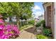 Charming yard and garden with crushed stone walkway at 308 S Pearl St, Rocky Mount, NC 27804