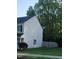 Charming two-story home with vinyl siding, a well-manicured lawn, and mature trees enhancing its curb appeal at 3244 Marcony Way, Raleigh, NC 27610