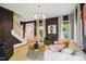 Bright living room featuring stylish furnishings, hardwood floors, and ample natural light for a welcoming ambiance at 3332 Cheswick Dr, Raleigh, NC 27609