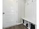 Mudroom features a built-in bench and coat hooks for easy organization as you enter the home at 361 W Copenhaver Dr, Clayton, NC 27527