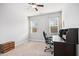 Home office featuring neutral carpet, a desk and a comfortable chair at 361 W Copenhaver Dr, Clayton, NC 27527