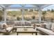 Cozy covered patio with comfortable outdoor seating, perfect for relaxing and enjoying the view at 361 W Copenhaver Dr, Clayton, NC 27527