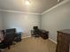 Bedroom with neutral carpet features space for a desk and dresser at 3954 Piney Grove Church Rd, Siler City, NC 27344