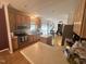 Bright kitchen features stainless steel appliances, wood cabinets, and an island perfect for meal preparation at 3954 Piney Grove Church Rd, Siler City, NC 27344