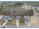 Panoramic aerial showcasing the home's prime location within a lush, wooded neighborhood at 416 Collinsworth Dr, Clayton, NC 27527