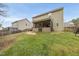Spacious backyard featuring a screened porch and green lawn at 416 Collinsworth Dr, Clayton, NC 27527