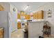 Efficient kitchen design with white appliances and ample cabinet space at 416 Collinsworth Dr, Clayton, NC 27527