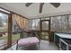 Relaxing screened porch with bench seating and views of the backyard at 416 Collinsworth Dr, Clayton, NC 27527