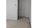 A bright bedroom is presented with neutral colored walls and base trim at 4502 Pale Moss Dr, Raleigh, NC 27606