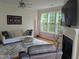 Comfortable living area with plush rug, fireplace, and ample natural light at 4502 Pale Moss Dr, Raleigh, NC 27606
