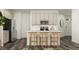 Well-appointed kitchen with sleek countertops, island seating, and stainless steel appliances at 525 Morning Light Dr # 31, Angier, NC 27501
