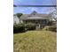 Charming home with mature shrubs, front porch and classic details at 609 N Magnolia Ave, Dunn, NC 28334