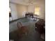 An empty living room featuring a ceiling fan at 609 N Magnolia Ave, Dunn, NC 28334