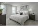 Inviting bedroom with soft lighting, plush bedding, and coordinated decor for a restful retreat at 62 Furley St, Sanford, NC 27330