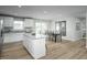 Bright kitchen featuring granite countertops and a dining area at 62 Furley St, Sanford, NC 27330