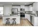 Well-equipped kitchen with stainless steel appliances and island at 62 Furley St, Sanford, NC 27330