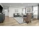 Bright living room with neutral tones, stylish sofas, and modern decor for comfortable living at 62 Furley St, Sanford, NC 27330