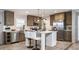 Modern kitchen featuring stainless steel appliances and a center island at 6648 Woodlawn Dr, Oxford, NC 27565